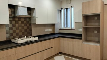 Kitchen in 4 BHK Apartment at Vasant Vihar – for Sale