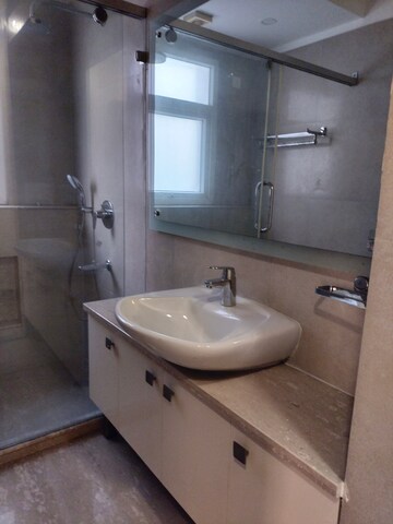 Bathroom in 4 BHK Apartment at Vasant Vihar – for Sale
