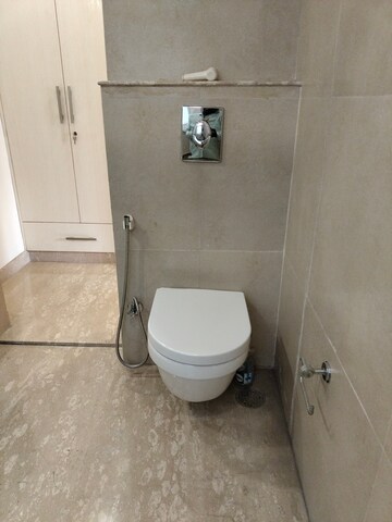 Bathroom in 4 BHK Apartment at Vasant Vihar – for Sale