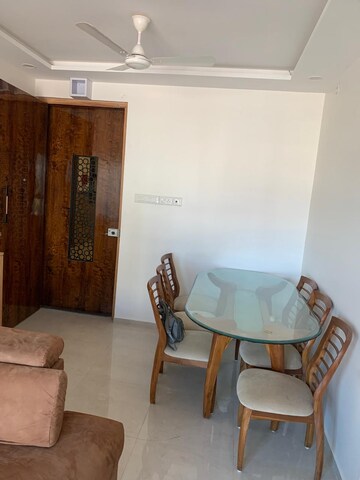 Living Room in 1 BHK Apartment at Naman Habitat, Andheri West – for Rent