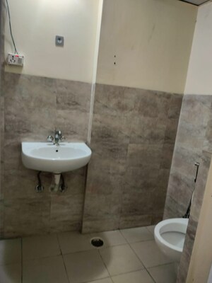 Bathroom in 2 BHK Apartment at Wave Dream Homes, Wave City – for Rent