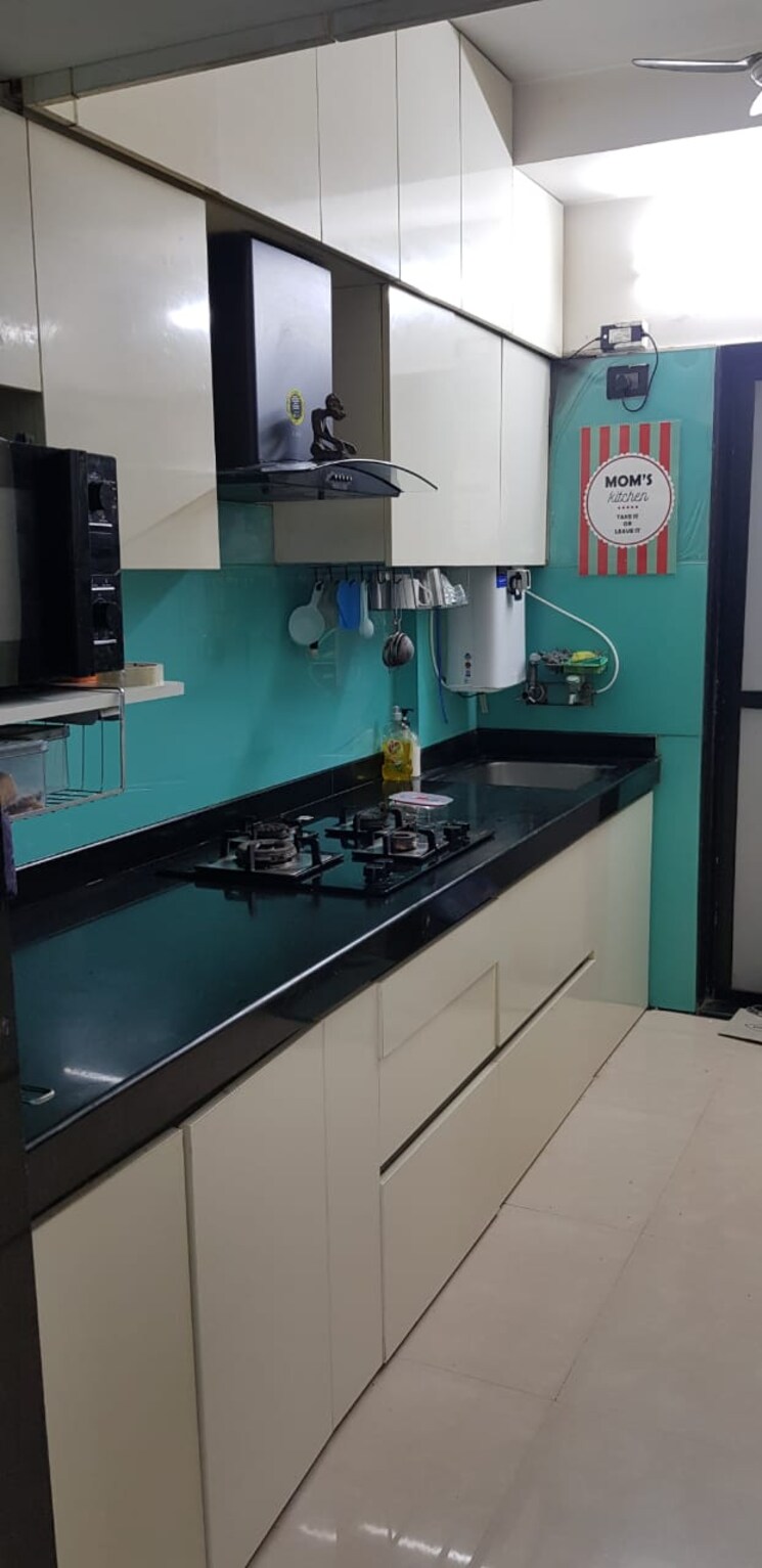 Kitchen, romell-serenity 2 Bedroom 800 Sq.Ft. Apartment In Oshiwara Mumbai 8893976