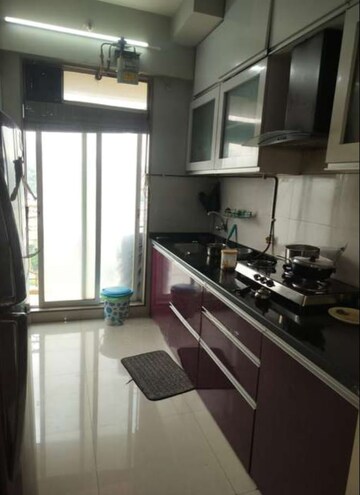 Kitchen in 1.5 BHK Apartment at Squarefeet Grand Square, Anand Nagar – for Rent