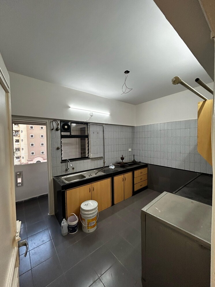 Kitchen, nri-complex-phase-i 2 Bedroom 1350 Sq.Ft. Apartment In Seawoods Sector 58 Navi Mumbai 8894042
