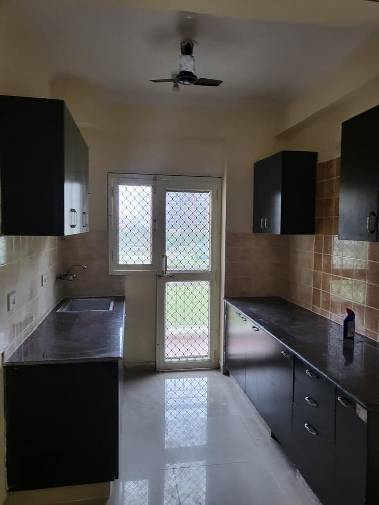Kitchen, aims-golf-city 2 Bedroom 950 Sq.Ft. Apartment In Sector 75 Noida 8894051