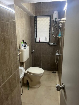 Bathroom in 1 BHK Apartment at Rockline The Meridian Towers, Ghatkopar West – for Sale