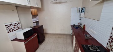 Kitchen in 3 BHK Apartment at Triveni Apartments Model Colony, Model Colony – for Rent