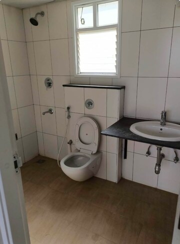Bathroom in 2 BHK Apartment at Godrej Aqua, International Airport Road – for Rent
