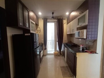 Living Room in 2 BHK Apartment at Sikka Karmic Greens, Sector 78 – for Rent