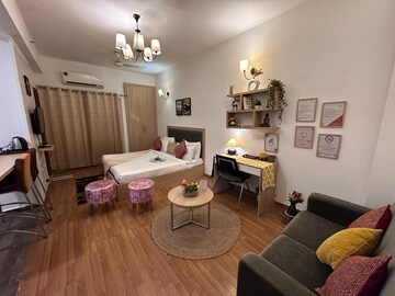 Living Room in Studio Apartment at Nimbus The Golden Palm, Sector 168 – for Sale