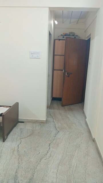 Room in 1 BHK Apartment at Mahalaxmi CHS Worli, Worli – for Rent