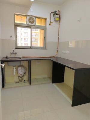 Kitchen in 2 BHK Apartment at Hiranandani Fortune City, New Panvel – for Rent