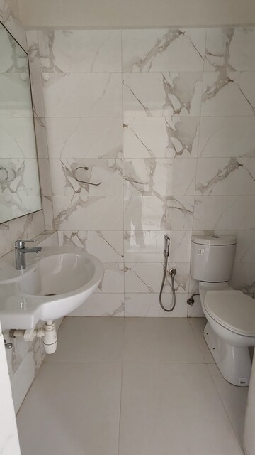 Bathroom in 2 BHK Apartment at Hiranandani Fortune City, New Panvel – for Rent