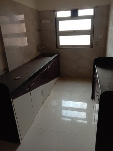 Kitchen in 2 BHK Apartment at Rajendra Dolphin Tower, Malad West – for Rent
