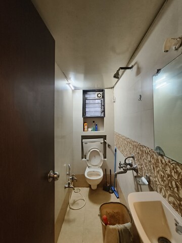 Bathroom in 1.5 BHK Apartment at Mangal Orchid Chs, Andheri West – for Rent