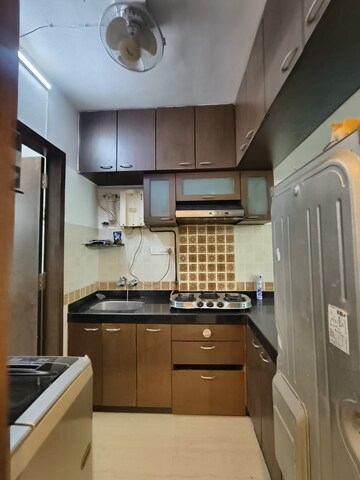 Kitchen in 1.5 BHK Apartment at Mangal Orchid Chs, Andheri West – for Rent