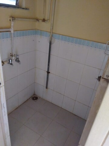 Bathroom in 1 RK Apartment at 56 Building Triveni Tower CHS Ltd, Kandivali West – for Rent