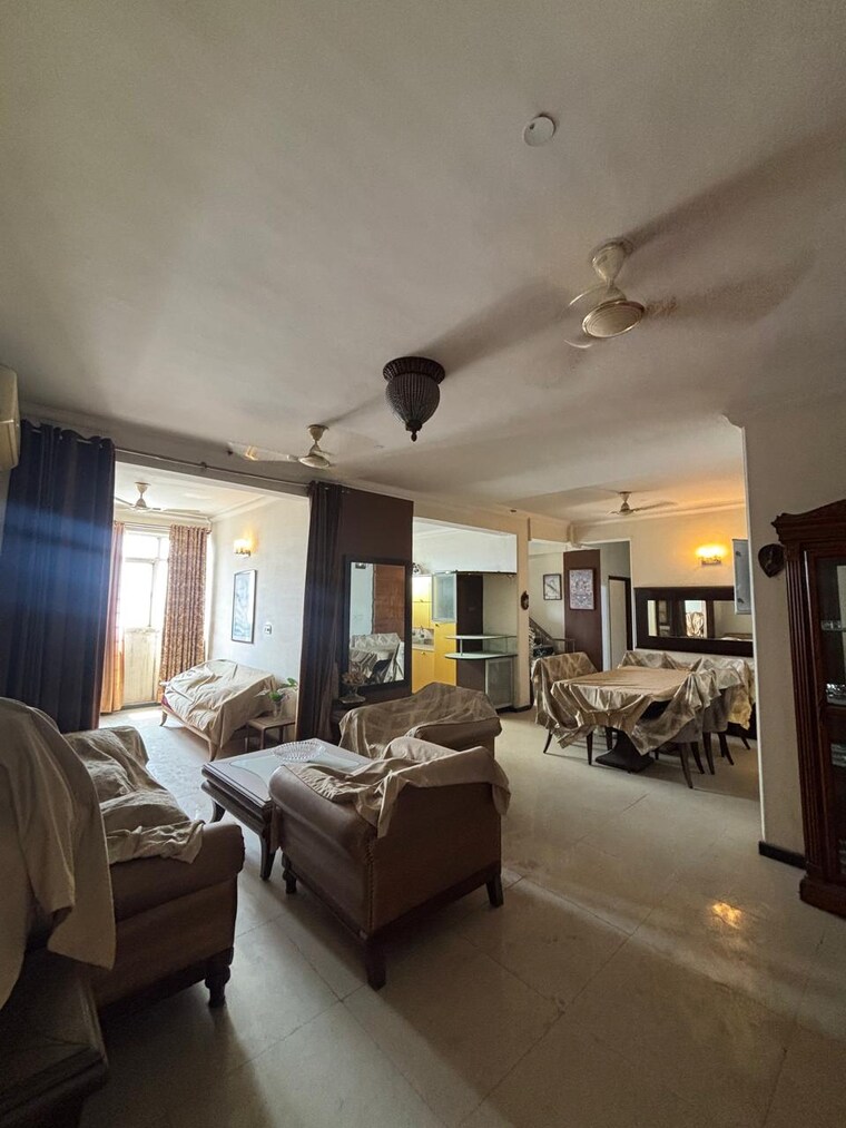 Living Room, aditya-mega-city 4 Bedroom 3105 Sq.Ft. Penthouse In Vaibhav Khand Ghaziabad 8894705