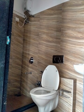 Bathroom in 2 BHK Apartment at Royal Oasis, Malad West – for Rent