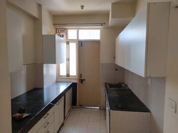 Kitchen in 3 BHK Apartment at Puri Aman Vilas, Sector 89 – for Sale