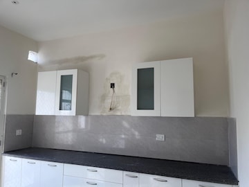 Kitchen in 3 BHK Apartment at Puri Aman Vilas, Sector 89 – for Sale