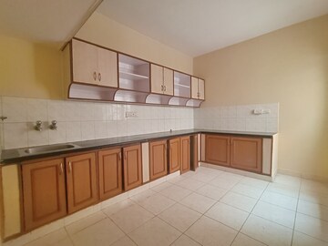 Kitchen in 2 BHK Apartment at Aishwarya Eastwoods, Hsr Layout – for Rent