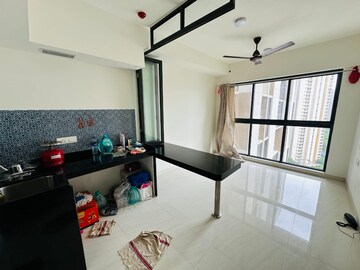 Living Room in 1 BHK Apartment at Lodha Crown Quality Homes, Majiwada – for Rent