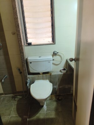 Bathroom in 2 BHK Apartment at Mohan Pride, Wayle Nagar – for Sale