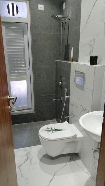 Bathroom in 1 BHK Apartment at Ruparel Optima, Kandivali West – for Rent
