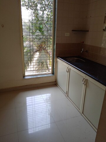 Kitchen in 2 BHK Apartment at Shree Datta Ashirwad, Belawali – for Sale