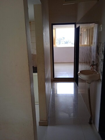 Building Lobby in 2 BHK Apartment at Shree Datta Ashirwad, Belawali – for Sale