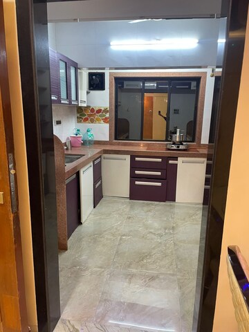 Kitchen in 3 BHK Apartment at Sea Breeze Tower, Nerul – for Rent