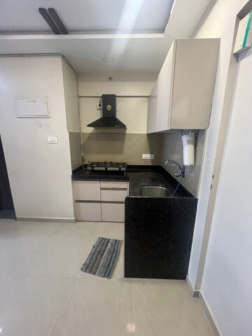 Kitchen in Studio Apartment at JP North Elara, Mira Road – for Rent