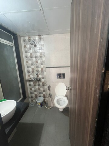 Bathroom in Studio Apartment at JP North Elara, Mira Road – for Rent