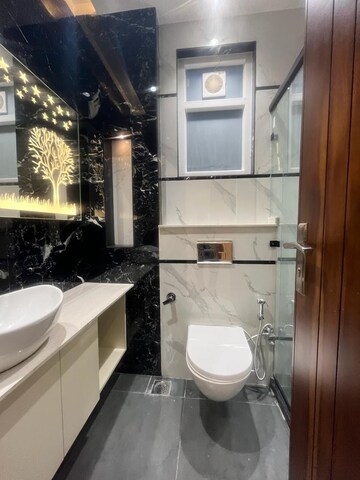 Bathroom in 3 BHK Apartment at Defence Colony – for Rent