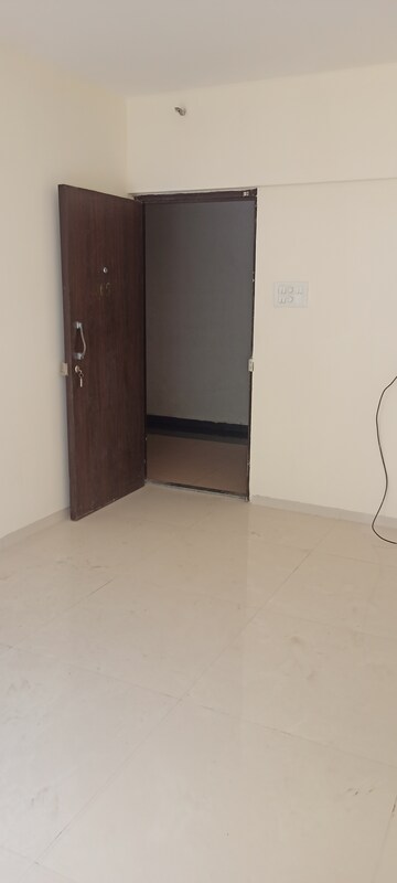Bedroom in 1 BHK Apartment at Rajendra Dolphin Tower, Malad West – for Sale