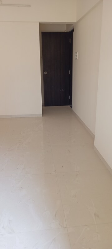 Room in 1 BHK Apartment at Rajendra Dolphin Tower, Malad West – for Sale