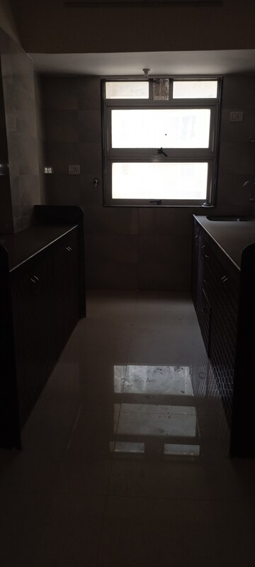 Kitchen in 1 BHK Apartment at Rajendra Dolphin Tower, Malad West – for Sale