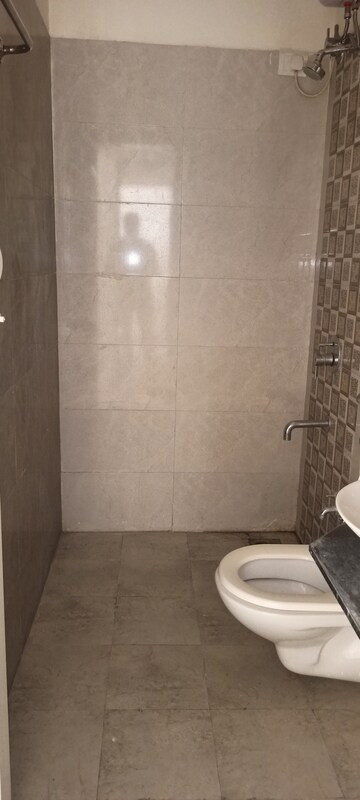Bathroom in 1 BHK Apartment at Rajendra Dolphin Tower, Malad West – for Sale