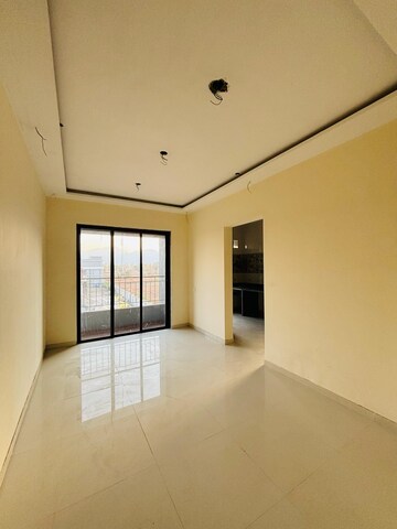 Living Room in 1 BHK Apartment at Panvelkar Greens, Badlapur East – for Sale