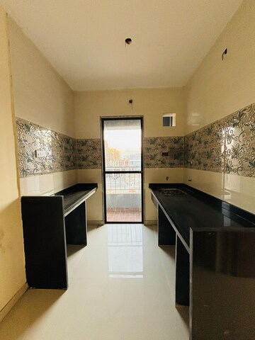 Kitchen in 1 BHK Apartment at Panvelkar Greens, Badlapur East – for Sale