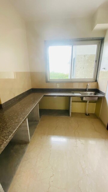 Kitchen in 3 BHK Apartment at Courtyard by Narang Realty and The Wadhwa Group, Pokhran Road No Two – for Rent