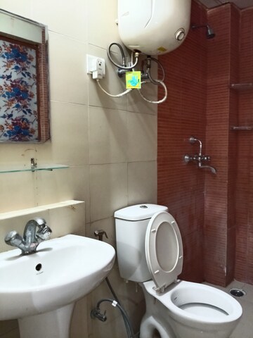 Bathroom in 2 BHK Apartment at Mahagun Mywoods, Sector 16c Greater Noida – for Rent