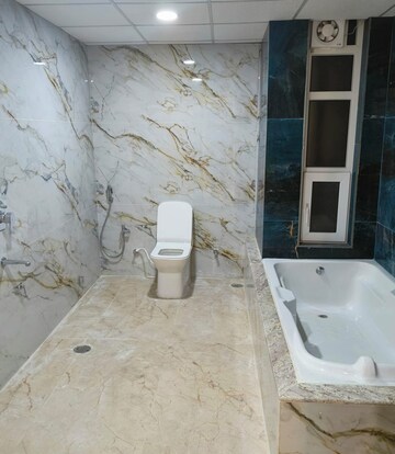 Bathroom in 4 BHK Apartment at Nitesh Logos, Mg Road – for Sale