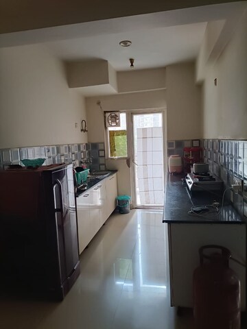 Kitchen in 2 BHK Apartment at Antriksh Golf View, Sector 78 – for Rent