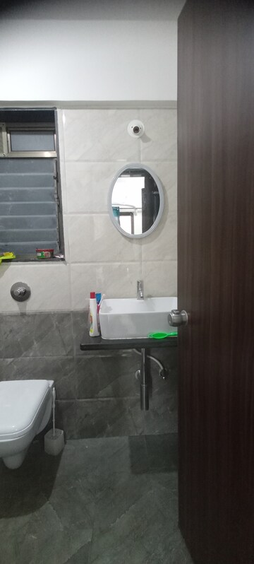 Bathroom in 1 BHK Apartment at Kalpavruksh Garden 1, Kandivali West – for Rent