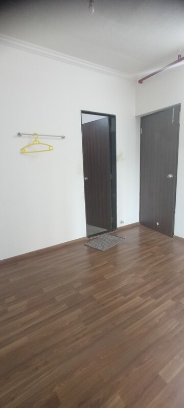 Bedroom in 1 BHK Apartment at Kalpavruksh Garden 1, Kandivali West – for Rent