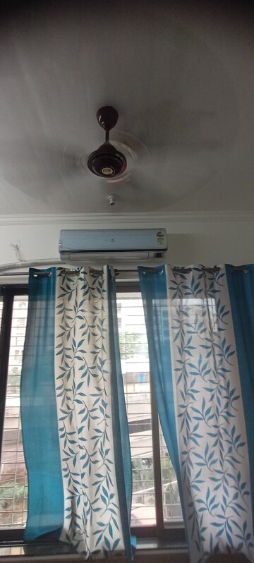 Bedroom in 1 BHK Apartment at Kalpavruksh Garden 1, Kandivali West – for Rent