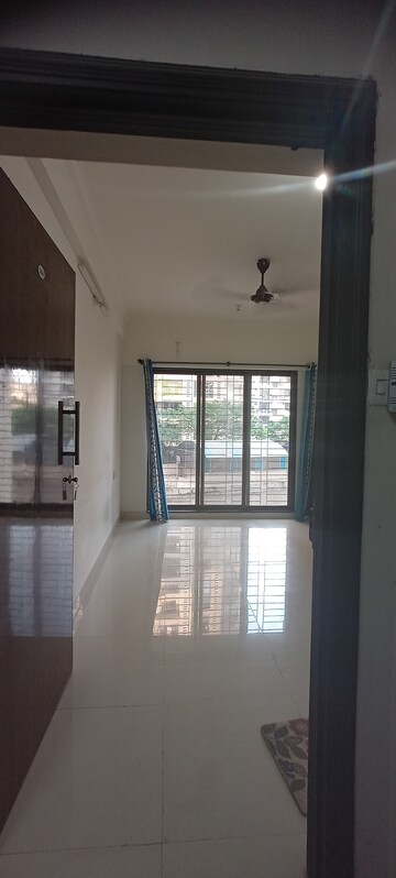 Living Room in 1 BHK Apartment at Kalpavruksh Garden 1, Kandivali West – for Rent