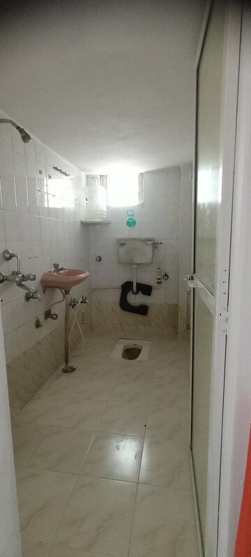 Bathroom in 2 BHK Apartment at Charkop Priya CHS, Kandivali West – for Rent
